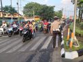 Cegah Kemacetan, Unit Lantas Polsek Asemrowo Lakukan Pengaturan Pagi