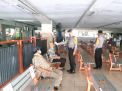 Anggota Piket Pospam Operasi Ketupat Polsek Pabean Cantikan Cek Suhu Badan Penumpang Kereta Api