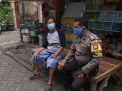 Amankan Pelaksanaan Pilwali, Babinkamtibmas Krembangan Utara Sampaikan Pesan Jaga Kerukunan