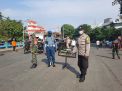 Kapolsek Pabean Cantikan Pimpin Operasi Gabungan Penertiban Masker di Jalan Kalimas