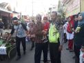 Unit Lantas Polsek Krembangan Kawal Acara Jalan Sehat Warga Tambak Asri