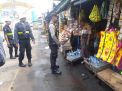 Satsabhara Polres Tanjung Perak Gelar Patroli Rutin di Pasar Ujung