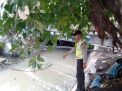 Polsek Semampir Lakukan Pemantauan Debit Air di Sungai Pegirian, Antisipasi Potensi Banjir