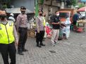 Panit Reskrim Polsek Krembangan Pimpin Operasi Masker, Sasar Pengunjung & Pedagang Pasar Kalianak