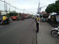 Satlantas Polres Tanjung Perak Lakukan Pengaturan Pagi, Lancarkan Perjalanan Pekerja