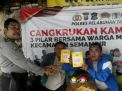 Babinkamtibmas Pegirian Sebar Brosur Sambil Sosialisasi SPKT Door To Door