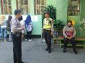 Babinkamtibmas Sidotopo Lakukan Pengamanan Daftar Ulang di SMAN 8