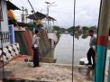 Polsek Kenjeran Pantau Ketinggian Rata-rata Air, Antisipasi Kemungkinan Potensi Banjir