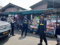 Satsabhara Polres Tanjung Perak Gelar Patroli Bersama Sekuruti Pelindo di Pasar Ujung