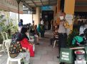 Babinkamtibmas Wonokusumo Amankan Pembagian Kartu Keluarga Sejahtera di Kantor BNI