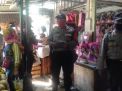 Polsek Semampir Bagikan Masker Gratis Untuk Pengunjung & Pedagang Pasar Pegirian