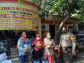 Babinkamtibmas Polsek Pabean Cantikan Kawal Pengambilan Bantuan Sembako