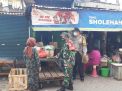 Polsek Asemrowo Sampaikan Himbauan Penggunaan Masker Kepada Para Pedagang Pasar Tambak Mayor