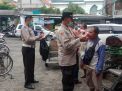 Wakapolsek Kenjeran Pimpin Operasi Masker di Pasar Raharjo Bulak Rukem Timur