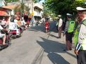 Kanit Intelkam Polsek Asemrowo Pimpin Operasi Yustisi Protokol Kesehatan di Jalan Asem Raya