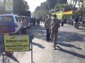 Kapolsek Asemrowo Pimpin Operasi Penertiban Masker Gabungan di Jalan Dupak Rukun