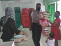 Babinkamtibmas Perak Utara Kawal Pembagian Sembako BPNT