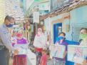 Babinkamtibmas Polsek Kenjeran Bagikan Bantuan Sembako Untuk Warga Tanah Merah