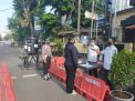 Urkes Polres Tanjung Perak Lakukan Cek Suhu Badan, Cegah Masuknya Virus Corona