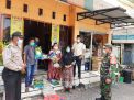 Babinkamtibmas Perak Timur Lakukan PAM Pengambilan Bantuan Sembako