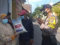 Babinkamtibmas Wonokusumo Bagikan Bantuan Beras Untuk Warga