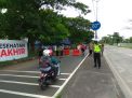 Polres Tanjung Perak Gelar Operasi Yustisi PPKM Bersama Personil Gabungan di Akses Tol Suramadu
