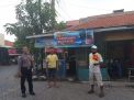 Babinkamtibmas Dupak Pasang Spanduk Pencegahan Penyebaran Virus Corona