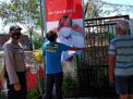 Babinkamtibmas Tambak Sarioso Pasang Spanduk Himbauan Masker Presiden Jokowi
