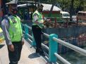 Polsek Pabean Cantikan Pantau Debit Air, Antisipasi Potensi Banjir di Sungai Kalimas