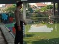 Pantau Debit Air, Polsek Krembangan Waspada Banjir di Rumah Pompa Gadukan