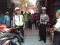 Kapolsek Pabean Cantikan Menghadiri Pembagian Sembako di Klenteng Tri Dharma