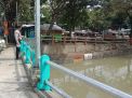 Polsek Pabean Cantikan Pantau Debit Air di Sungai Kalimas, Waspada Potensi Banjir