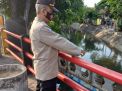 Polsek Semampir Pantau Debit Air di Sungai Pegirian, Waspada Potensi Banjir