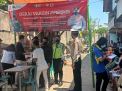 Polsek Asemrowo Kawal Home Care Vaksin di Balai RW 03 Genting Kalianak