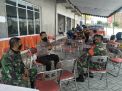 Panit Binmas Polsek Krembangan Ikut Kawal Pembagian BST
