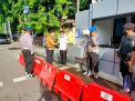 Urkes Bag Sumda Polres Tanjung Perak Lakukan Cek Suhu Badan di Gerbang Mako
