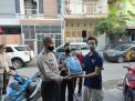 Polsek Kenjeran Bagikan Bantuan Sembako Untuk Warga RW 05 Kelurahan Bulak