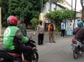 Polsek Kenjeran Laksanakan Operasi Masker Bersama Satpol PP Kecamatan Bulak