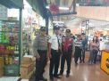 Babinkamtibmas Bongkaran Pantau Aktivitas Masyarakat di Mall Pasar Atom