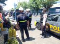 Satsabhara Polres Tanjung Perak Gelar Patroli Bersama di Pasar Ujung