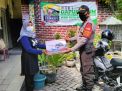 Polsek Asemrowo Berikan Bantuan Kompor Gas Untuk Kampung Tangguh