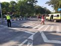 Unit Lantas Polsek Kenjeran Lakukan Pengaturan Lalu Lintas Pagi, Cegah Kemacetan