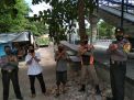 Babinkamtibmas Polsek Kenjeran Bagikan Masker Gratis