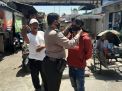 Babinkamtibmas Krembangan Utara Bagikan Masker Ke Warga Babaan