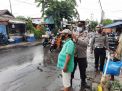 Wakapolsek Kenjeran Pimpin Operasi Masker di Pasar Pogot, Bagikan Masker Gratis Kepada Pelanggar Prokes