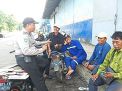 Babinkamtibmas Perak Utara Ajak Pekerja Pelabuhan Tidak Golput