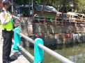 Polsek Pabean Cantikan Pantau Debit Air di Sungai Kalimas, Waspadai Potensi Banjir