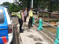 Polsek Pabean Cantikan Pantau Debit Air di Sungai Kalimas