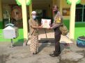 Babinkamtibmas Perak Timur Bagikan Sembako Untuk Takmir Masjid