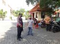 Satsabhara Polres Tanjung Perak PAM Kebaktian Minggu & Sosialisasikan Pentingnya Masker